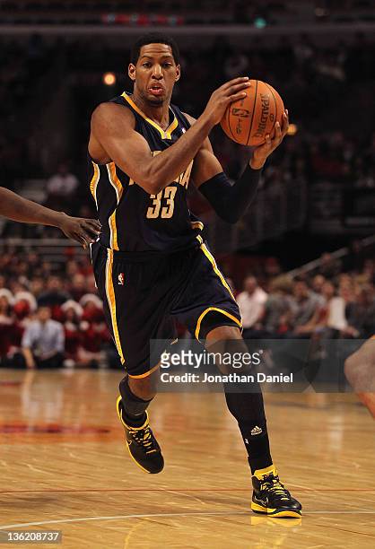 Danny Granger of the Indiana Pacers moves against the Chicago Bulls at the United Center on December 20, 2011 in Chicago, Illinois. The Bulls...