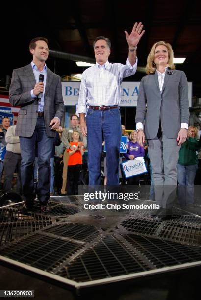 Former Massachusetts Governor and Republican presidential candidate Mitt Romney , his wife Ann Romney and U.S. Rep. Aaron Schock stand on a piece of...