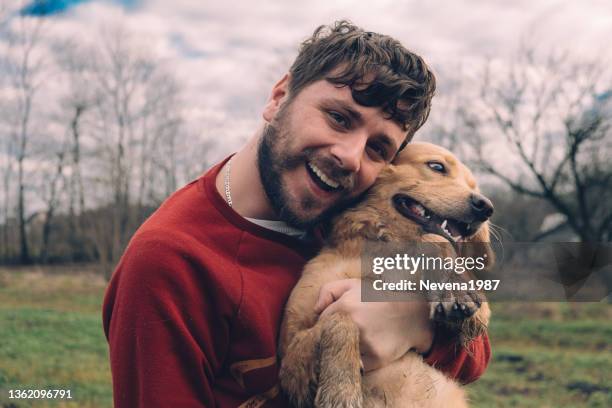 man and dog enjoying  in nature - dog agility stock pictures, royalty-free photos & images