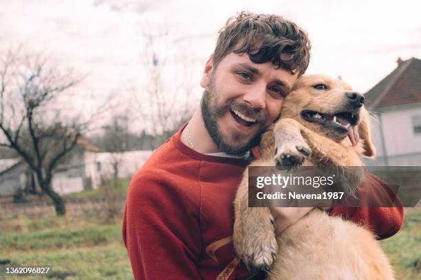 man and dog enjoying  in nature - dog agility stock pictures, royalty-free photos & images