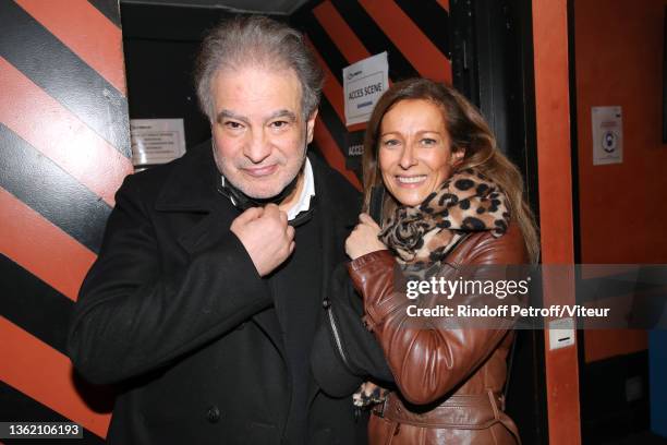 Raphaël Mezrahi and Anne Gravoin pose after the "Laurent Gerra sans Moderation" Show at L'Olympia on December 30, 2021 in Paris, France.