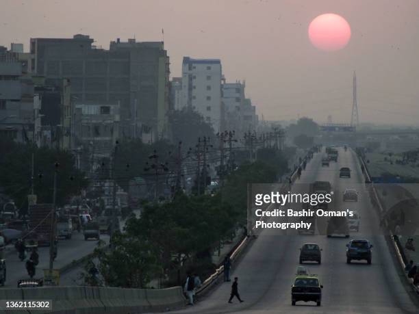 last sunset of 2021 in karachi - karachi city stock pictures, royalty-free photos & images