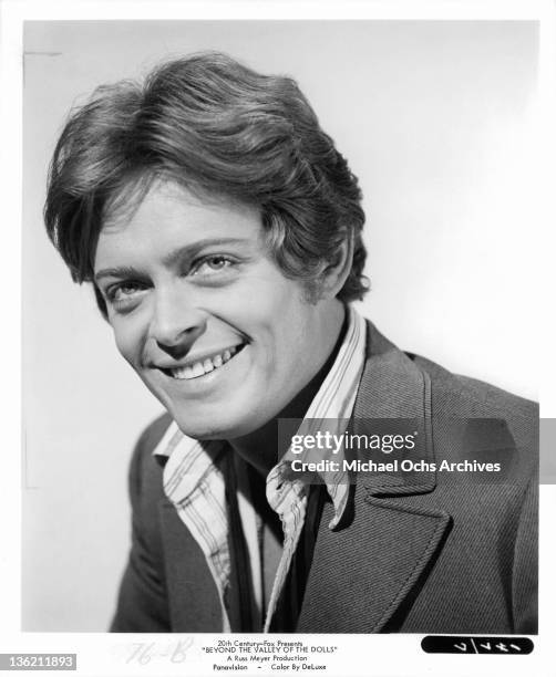 Michael Blodgett smiling in a scene from the film 'Beyond The Valley Of The Dolls', 1970.