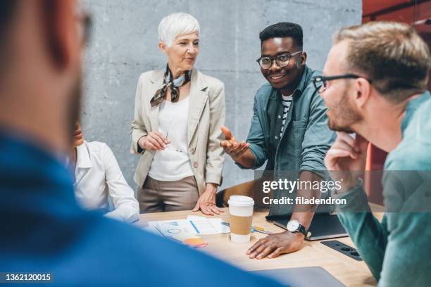 business discussion - mixed age range stock pictures, royalty-free photos & images