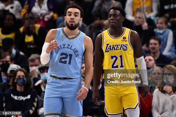 Memphis Grizzlies guard Tyus Jones and Los Angeles Lakers guard Darren Collison during the game at FedExForum on December 29, 2021 in Memphis,...