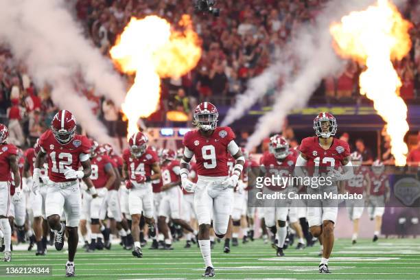Alabama Crimson Tide players takes the field prior to playing the Cincinnati Bearcats in the Goodyear Cotton Bowl Classic for the College Football...