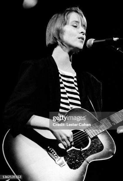 American singer-songwriter Suzanne Vega performs on stage during a concert circa 1990 in Los Angeles, California.