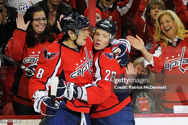 Alexander Semin of the Washington Capitals celebrates with Alex Ovechkin of the Washington Capitals after scoring a goal against the New York Rangers...