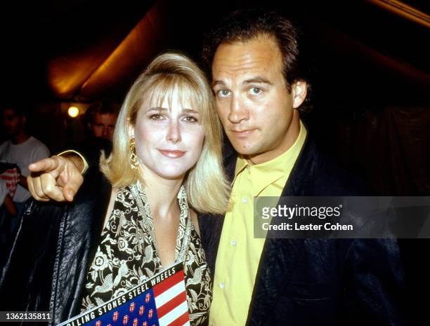 American actress Marjorie Bransfield and American actor, comedian, singer and musician Jim Belushi attend the Rolling Stones concert during the 1989...