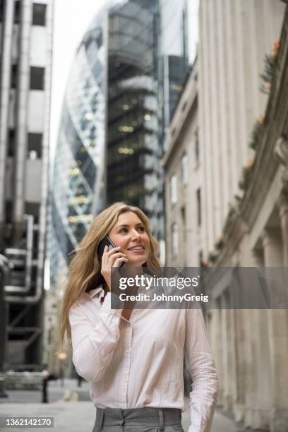 candid portrait of london businesswoman taking a break - city of london workers stock pictures, royalty-free photos & images