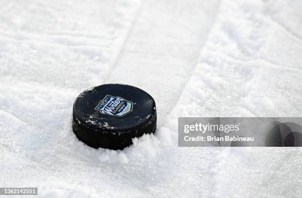 Detailed view of an official Winter Classic during the Minnesota Wild team practice session before the 2022 NHL Winter Classic between the St. Louis...