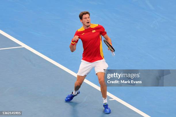 Pablo Carreno Busta of Spain reacts as he wins his match against Alejandro Tabilo of Chile during the day one 2022 ATP Cup tie between Chile and...