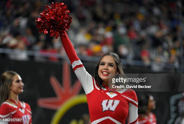 Wisconsin Badgers cheerleader performs during the SRS Distribution Las Vegas Bowl between the Arizona State Sun Devils and the Badgers at Allegiant...