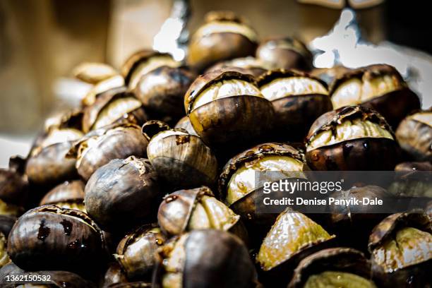 roasted chestnuts - panyik-dale stock pictures, royalty-free photos & images