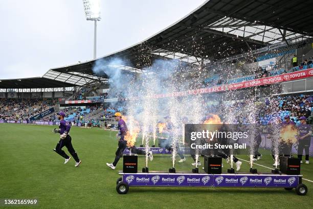 Matthew Wade of the Hurricanes leads out the team during the Men's Big Bash League match between the Hobart Hurricanes and the Brisbane Heat at...