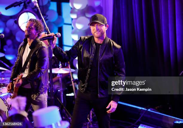 In this image released on December 31, 2021 Cole Swindell performs during the New Year's Eve Live Nashville's Big Bash at Luke's 32 Bridge Food +...