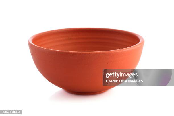 earthen bowl isolated on white background - schale stock-fotos und bilder