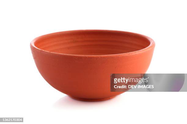 earthen bowl isolated on white background - bowls stock pictures, royalty-free photos & images