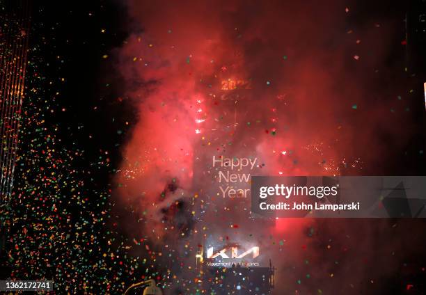 Confetti fall as the ball drops over Times Square during the 2022 New Year’s Eve celebrations on January 01, 2022 in New York City. Despite a major...