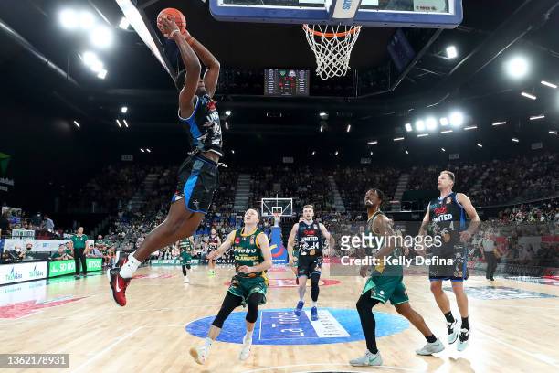Ariel Hukporti of Melbourne United slam dunks during the round five NBL match between Tasmania JackJumpers and Melbourne United at MyState Bank Arena...