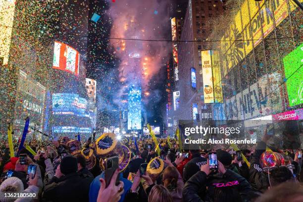 Revelers celebrate New Year’s Eve in Times Square on January 01, 2022 in New York City. Despite a surge in COVID-19 cases New Year’s Eve happened as...