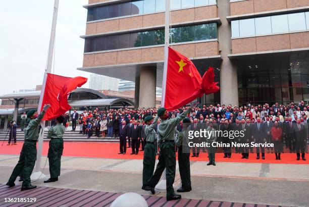 Students perform the flag-raising ceremony at the Hong Kong Polytechnic University on New Year's Day on January 1, 2022 in Hong Kong, China.