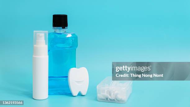 white healthy teeth, different tools for dental care. dental background. - fluor stockfoto's en -beelden