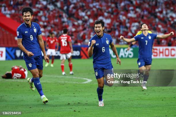 Sarach Yooyen of Thailand celebrates with his teammates after scoring their second goal against Indonesia in the second half during the second leg of...