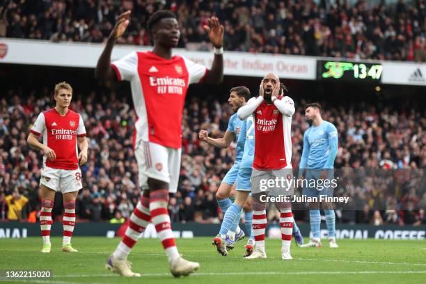 Alexandre Lacazette of Arsenal reacts during the Premier League match between Arsenal and Manchester City at Emirates Stadium on January 01, 2022 in...