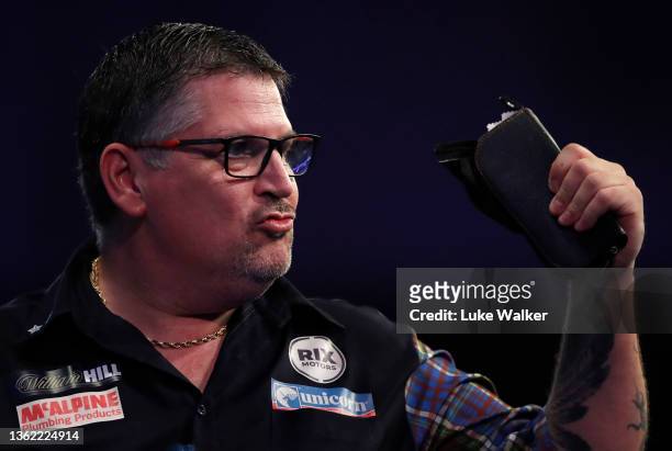 Gary Anderson of Scotland reacts to the win during his Quarter-Finals Match against Luke Humphries of England during Day Fourteen of The William Hill...