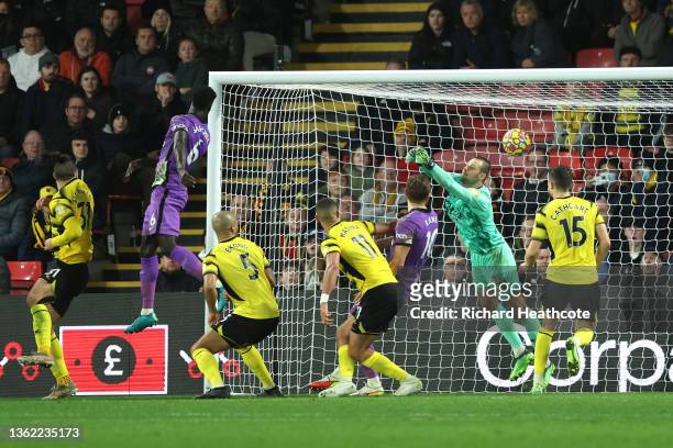 Davinson Sanchez of Tottenham Hotspur scores their side's first goal during the Premier League match between Watford and Tottenham Hotspur at...
