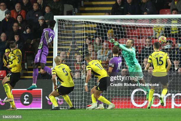 Davinson Sanchez of Tottenham Hotspur scores their side's first goal during the Premier League match between Watford and Tottenham Hotspur at...