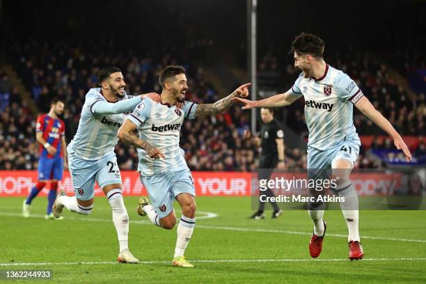 Manuel Lanzini of West Ham United celebrates with teammates Said Benrahma and Declan Rice after scor their side's second goal during the Premier...