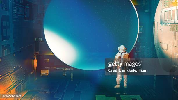 astronaut is on  a mission in space and looks out of a window - space station 個照片及圖片檔