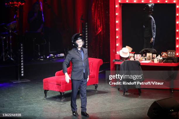 Laurent Gerra imitates François Hollande during his "Laurent Gerra sans Moderation" Show at L'Olympia on December 31, 2021 in Paris, France.