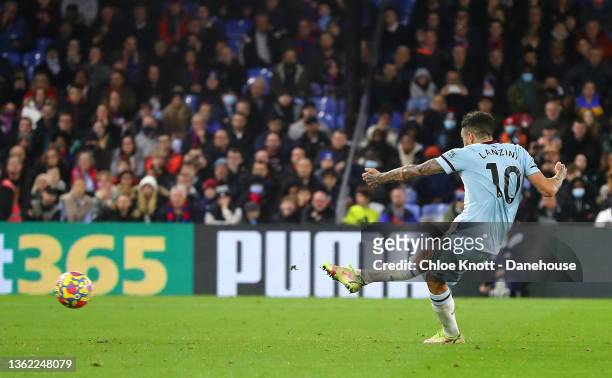 Manuel Lanzini of West Ham United scores a penalty for his team making it 0-3 during the Premier League match between Crystal Palace and West Ham...