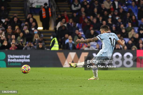 Manuel Lanzini of West Ham United scores their side's third goal from the penalty spot during the Premier League match between Crystal Palace and...