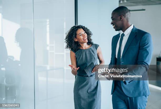 business people in the office. - zwart pak stockfoto's en -beelden