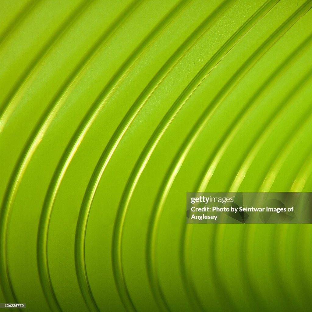 Abstract green curves, square crop