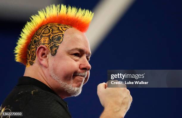 Peter Wright of Scotland reacts to the win during his Quarter-Finals Match against Callan Rydz of England during Day Fourteen of The William Hill...