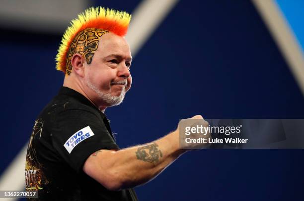 Peter Wright of Scotland reacts to the win during his Quarter-Finals Match against Callan Rydz of England during Day Fourteen of The William Hill...