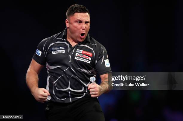 Gerwyn Price of Wales reacts during his Quarter-Finals Match against Michael Smith of England during Day Fourteen of The William Hill World Darts...