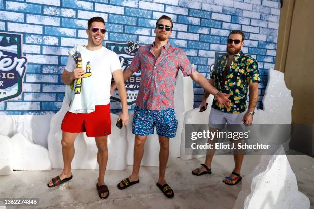 David Perron, Pavel Buchnevich and Ryan O'Reilly of the St. Louis Blues arrive for the 2022 NHL Winter Classic between the St. Louis Blues and the...