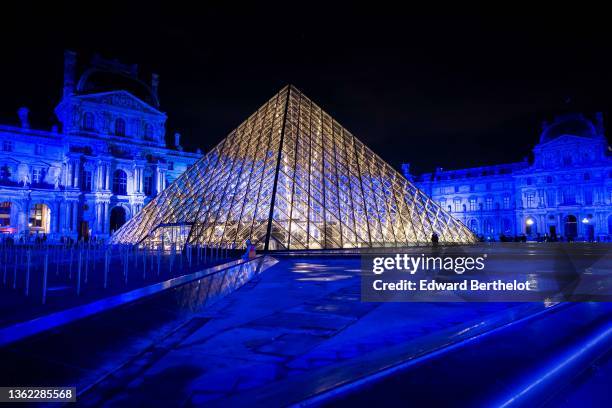 The Louvre museum is illuminated in blue, on January 01, 2022 in Paris, France. In 2022 France will hold presidential elections in April. Also this...