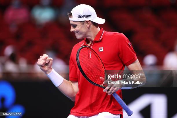 John Isner of the United States celebrates a point during his group C match against Brayden Schnur of Canada during day two of the 2022 ATP Cup tie...