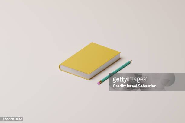 3d illustration. close up of a hardcover book and a pencil on isolated background with copy space. - book illustration fotografías e imágenes de stock