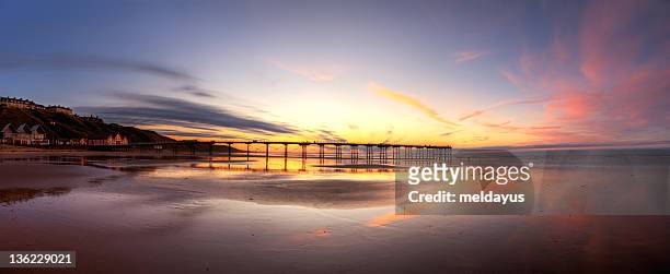 saltburn pier at sunset - saltburn stock pictures, royalty-free photos & images