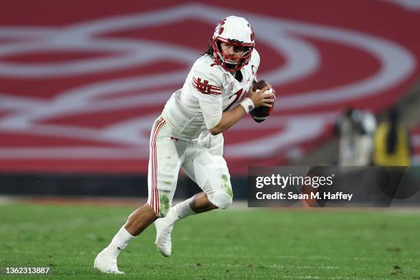 Cameron Rising of the Utah Utes rolls out during the first half of the Rose Bowl game against the Ohio State Buckeyes at Rose Bowl Stadium on January...