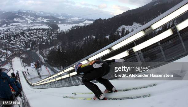 Andreas Kofler of Austria competes during the training round for the FIS Ski Jumping World Cup event of the 60th Four Hills ski jumping tournament at...