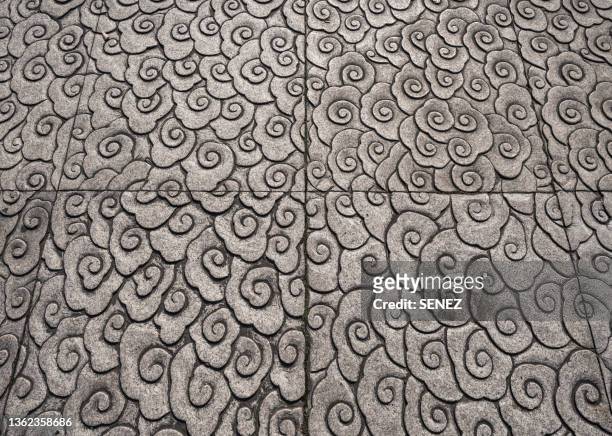 full frame shot of cloud pattern chinese bas relief - lågrelief bildbanksfoton och bilder